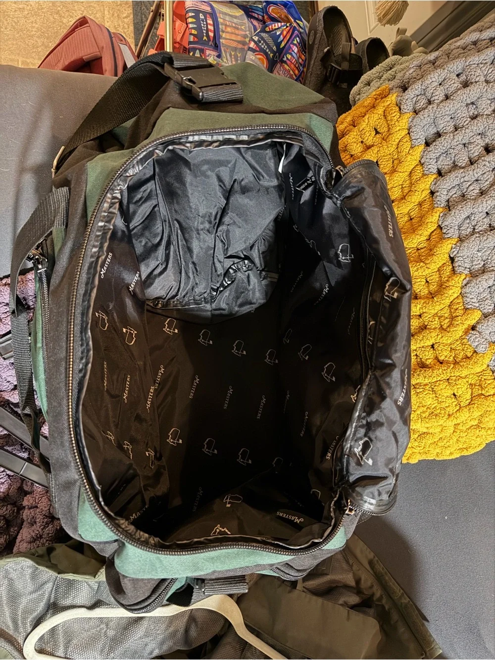 Masters Green and Black Travel Duffel with Embroidered Yellow Map Logo